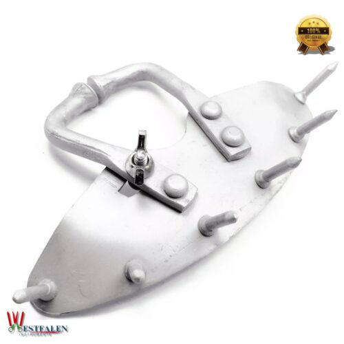 Metal calf nose ring with spikes designed to prevent milk sucking and assist in weaning young cattle, from Westfaleninstrumente